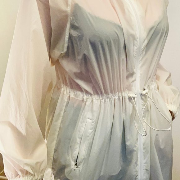 This is The Constant White Clear Overcoat - Picture 3 of 3